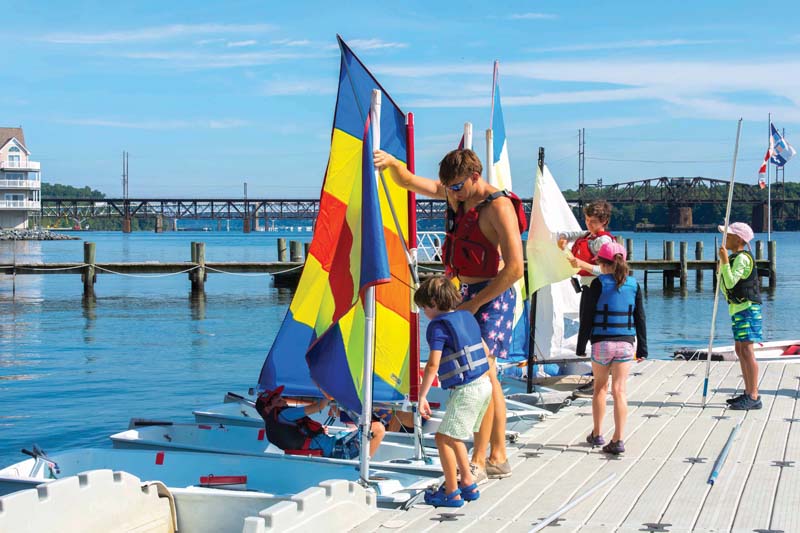 Havre de Grace Youth Program 2024 instructor and youth sailors on dock during youth sailing course