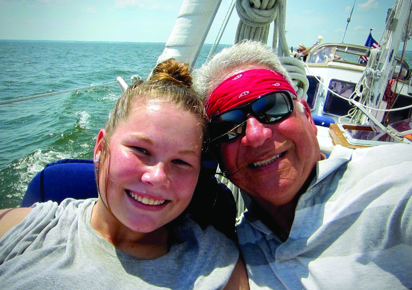 Capt. Aram and Amelia take a selfie while sailing out of Solomons aboard Heron.  					