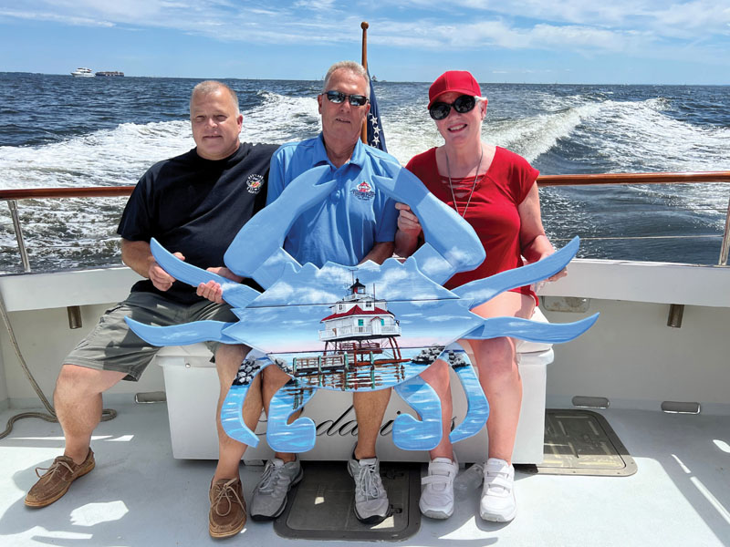 painted Phillip Smith blue crab aboard boat