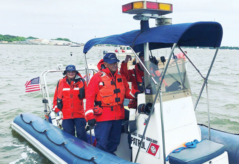 US Coast Guard Auxiliary operating a small powerboat