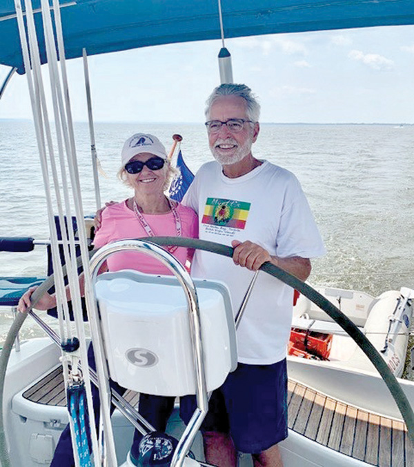 The Caffos return from a recent New England cruise Couple sailing a keelboat