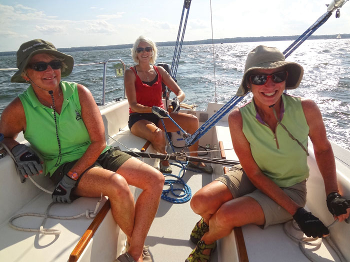 Friends bonding over sailing. Photo by Sail Solomons.