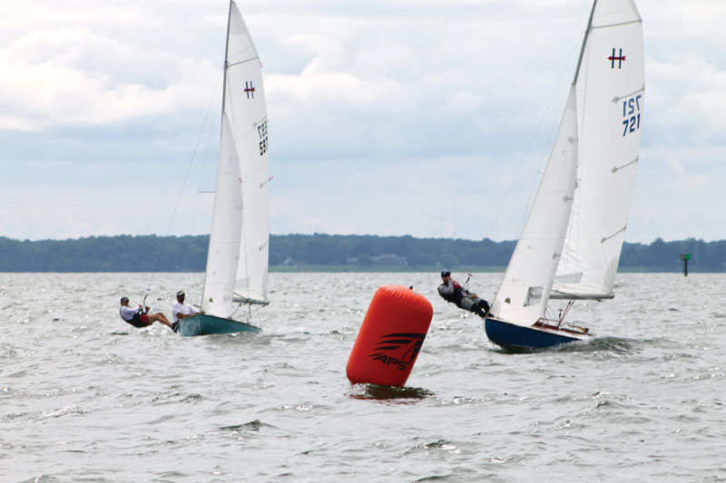 Hampton One-Design sailboats approaching a mark Hampton One-Design sailboats approaching a mark
