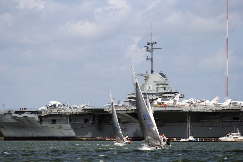 Charleston Race Week sailing with USS Yorktown in backdrop