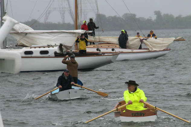 Competitors rowing to their anchored boats as in days of yore. Photo by Craig LIgibel