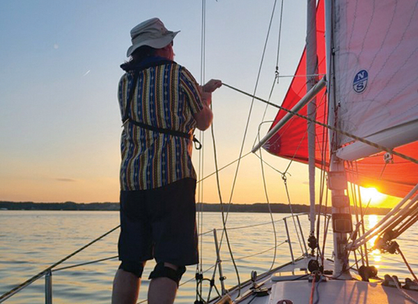 Sunset finish sailboat racing