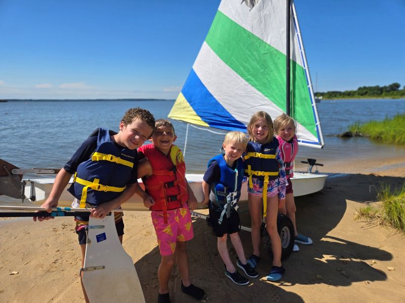 Kids at sail camp. Photo courtesy of Rock Hall Yacht Club Sailing School Kids on a sailboat during Sail Camp on the Chesapeake Bay Eastern Shore