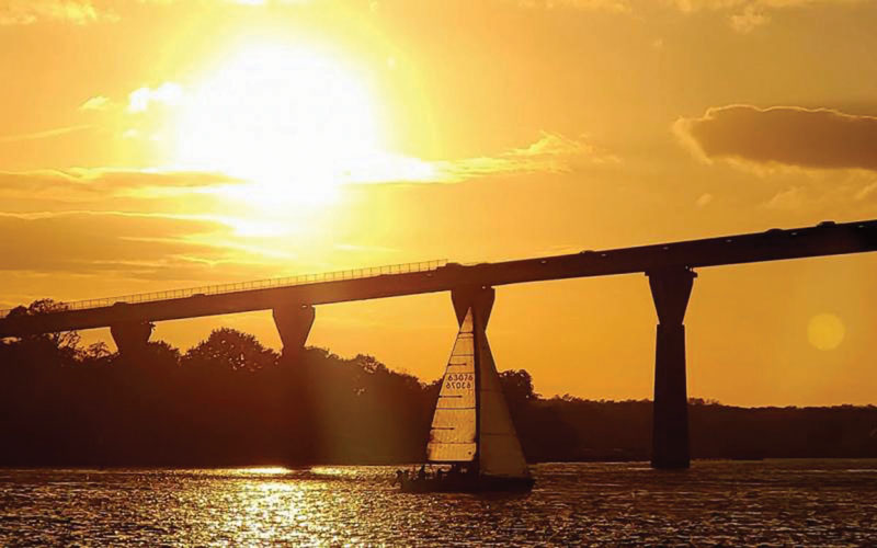 Sunset sailing on the Summer Sailstice Sailboat at sunset