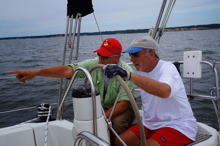 To really make progress improving your sailing skills, learn from the experts. Photo courtesy of Sail Solomons.