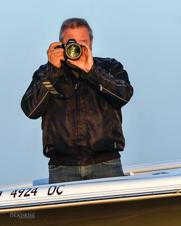 photographer on a boat