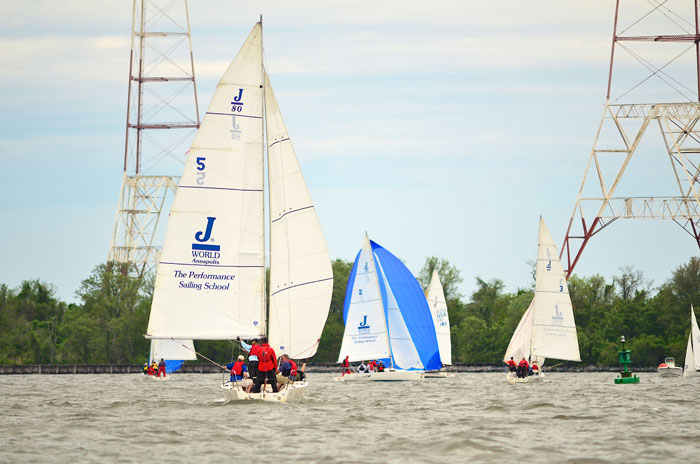 To improve boathandling work with a coach who knows your kind of boat. Spinnaker class photo courtesy of J/World Annapolis.