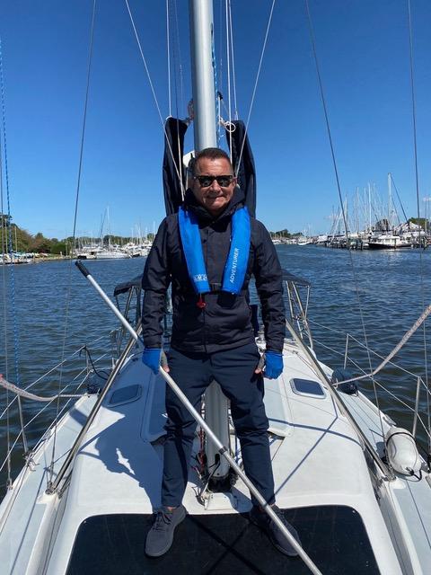 aboard his sailing vessel