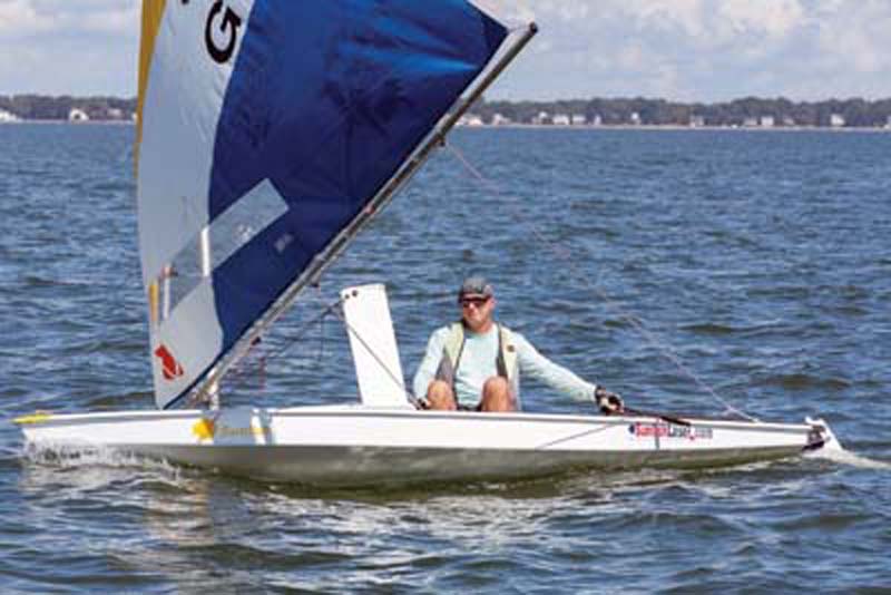 Etherington sailing a Sunfish