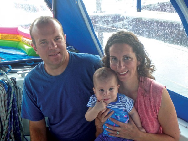 Bryan, Sharon, and Mallory aboard their cruising sailboat