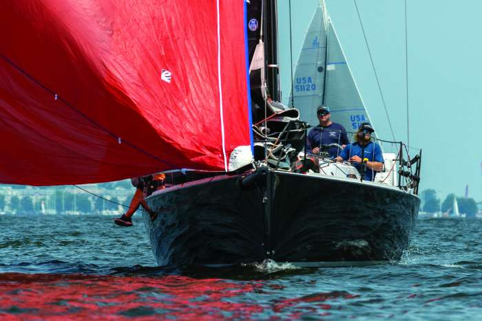 dark storm sailboat racing offshore