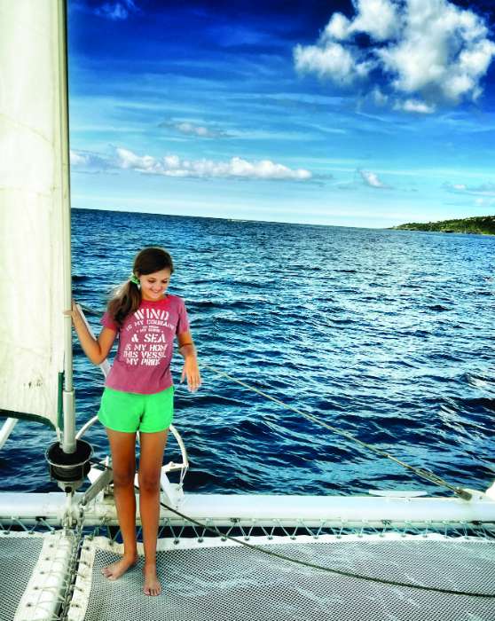 girl on catamaran