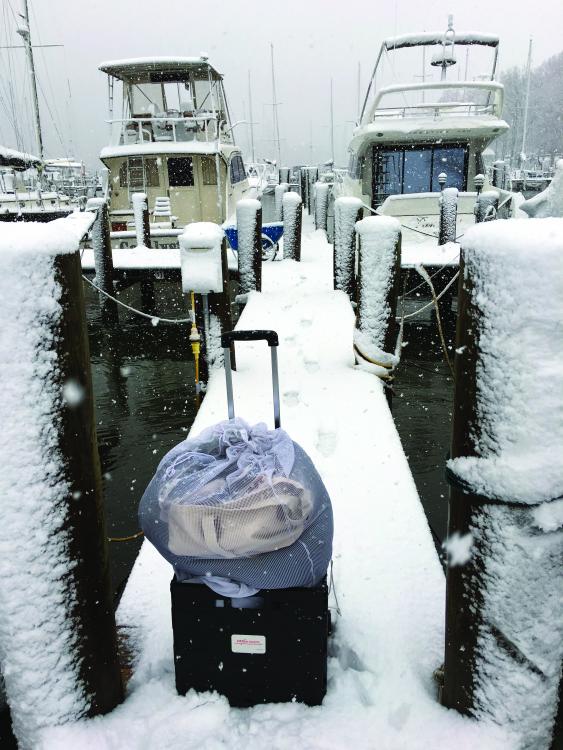 Winter liveaboard sailor dock chesapeake