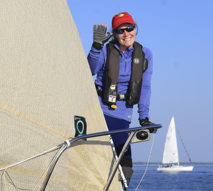 smiling bow woman sailing