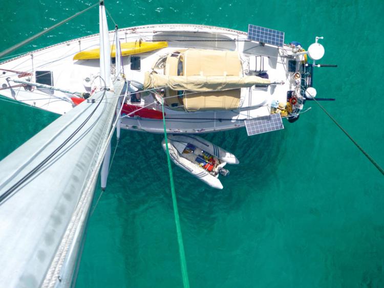 The author's cruising sailboat at anchor