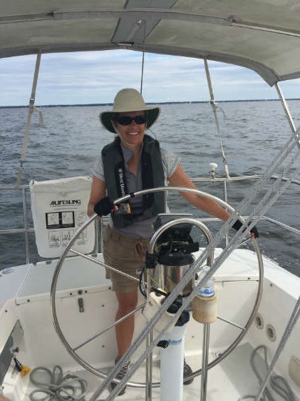 SpinSheet's own Beth Crabtree at the helm during a J/World Annapolis cruising course