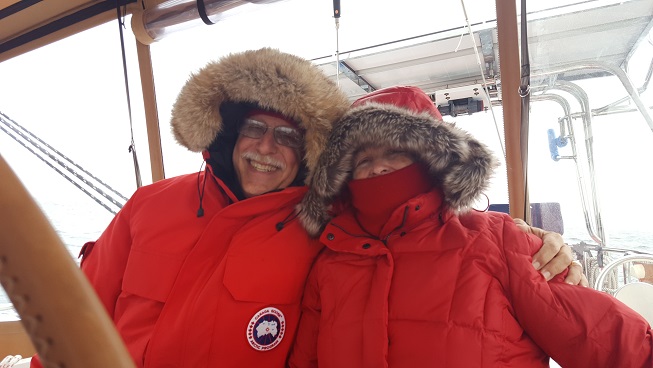 The Simons celebrate crossing the Arctic Circle on their Taswell 58 Celebrate in Greenland's Disko Bay.