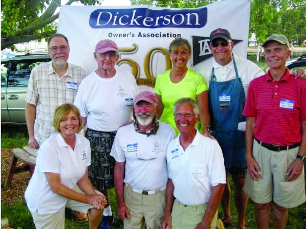 Dickerson owners celebrating their 50th: (first row L-R) Judy Creighton, Bruce Franz, and Barry Creighton; (second row) Sam Webster, Joe Slavin, Nettie Hastings, Bill Toth, and Bob Smith.