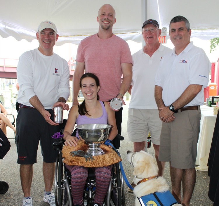 Dani Izzie (seated), Scott Gitchell, Rudy Izzie, Peter Gordon, and Brad LaTour... plus Xander the service dog.