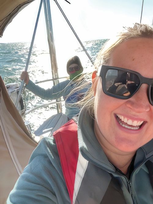 Emily Bartlett on a sailboat