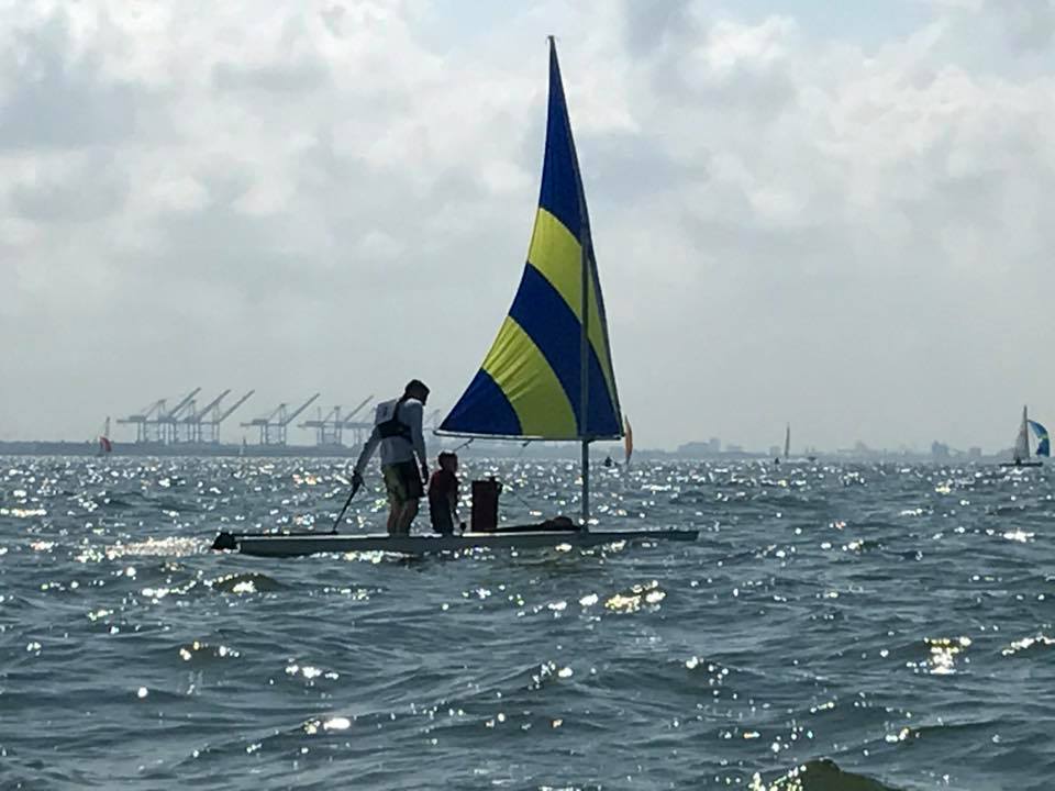 Father-son sailing.