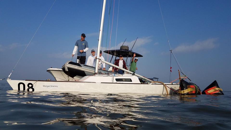 Bow 8 raised from the dead and towed thru the J22 fleet at the start of the 1st race on the last day of the J/22 Midwinters. Thank you diver extraordinary Ricardo Gutierrez !