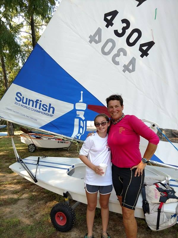 JR Futcher and a young Sunfish sailor.