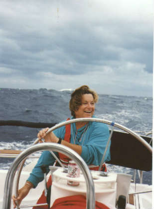 Mary Ann DeGraw at the helm off Cape Hatteras, delivering a Hunter 43 from Miami to Annapolis 