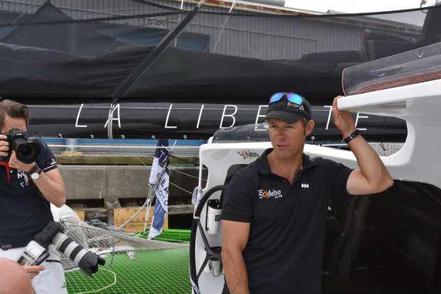 Thomas Coville aboard Sodebo Ultim, the 110-foot tri he broke the solo around-the-world record on. Photo by SpinSheet