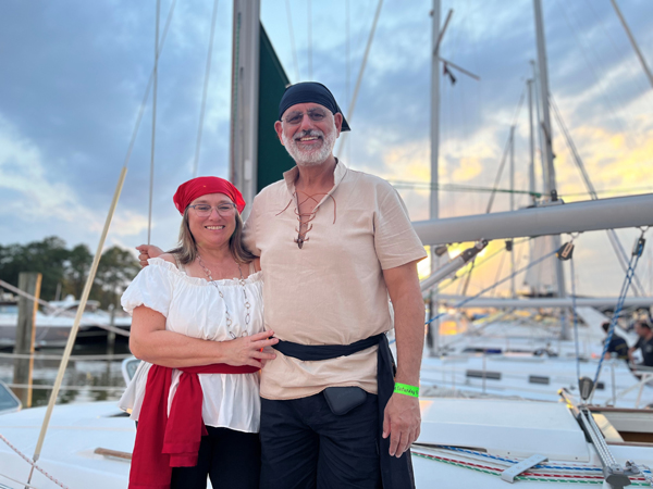Sailing couple dressed as pirates