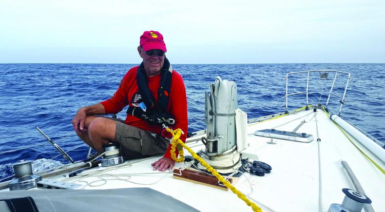 Richard inspects what's left of Molto Bene's mast.