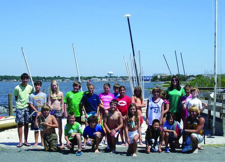 The whole crew gathers at the Rehoboth Bay Sailing Association.