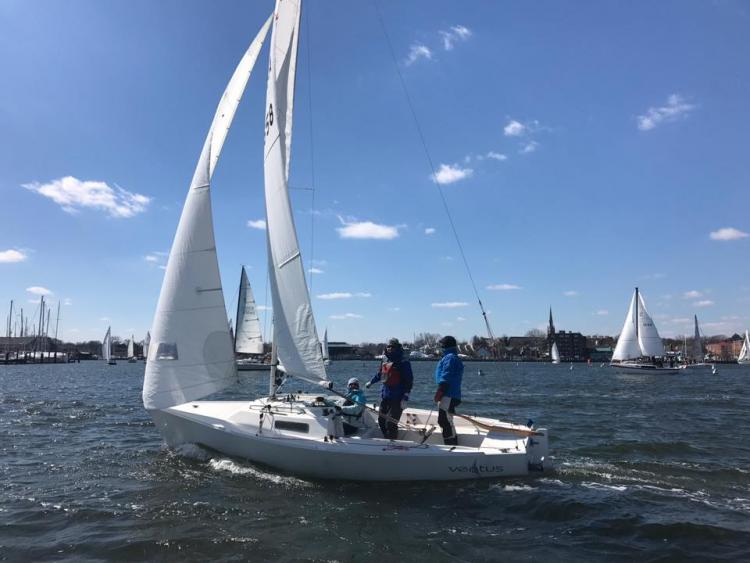 Scott Gelo, Jennifer Bickford, and Grant Beach onboard Ventus, in the hunt for hardware in the J/22 fleet