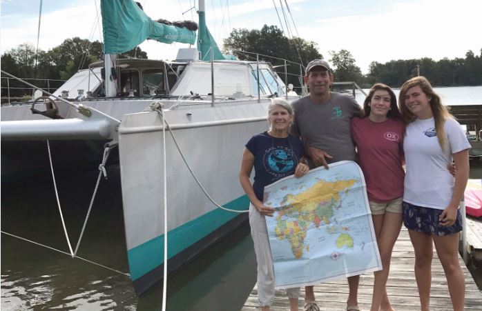 The Johnsons and Elcie on her home dock in Oxford