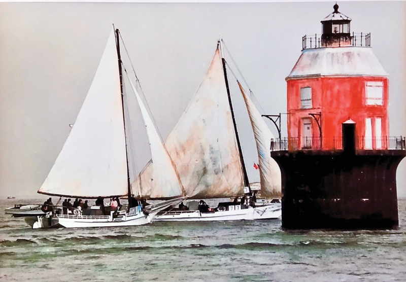Chesapeake Skipjacks and Lighthouse by Krentel