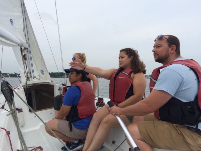 Skipper Justin practicing man overboard recoveries, while spotter Megan keeps track of the “man overboard”