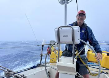 Tom Shaw in a squall north of Bermuda by Bill Carruth