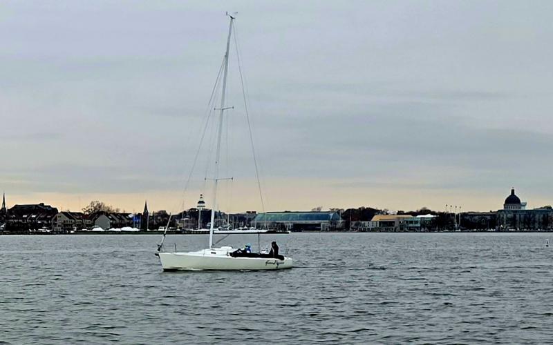 A lone sailboat out near the Horn Point shoal pole ...