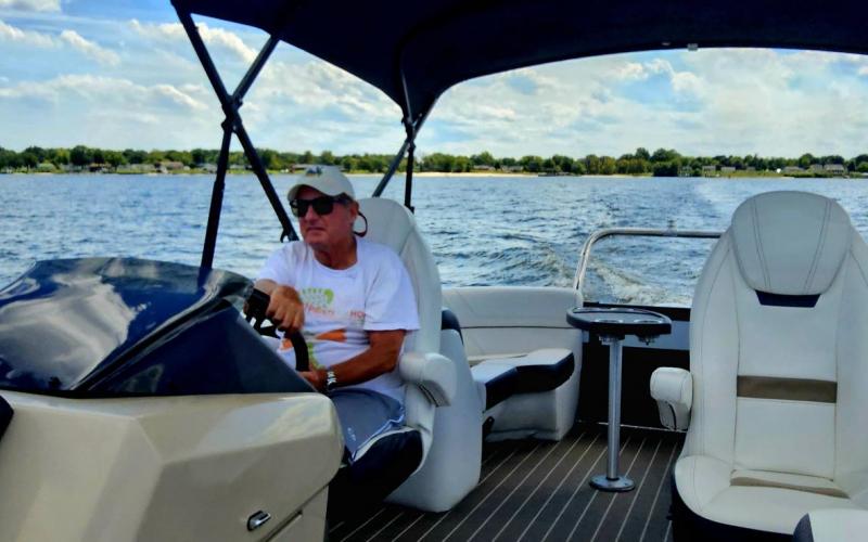 Alan commandering the boat.