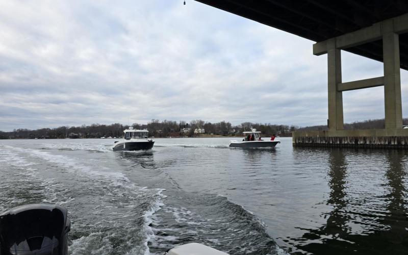 Our 3-boat flotilla heading under the Rte 2 bridge and up the South River to Thomas Point Light.