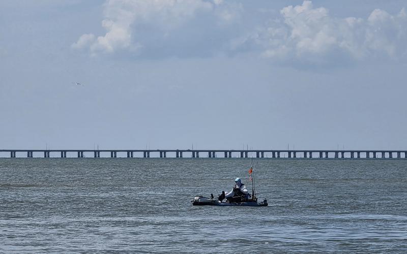 All alone in his kayak