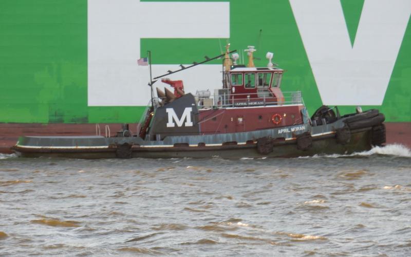 Tugboat April Moran assisting container ship Ever Model