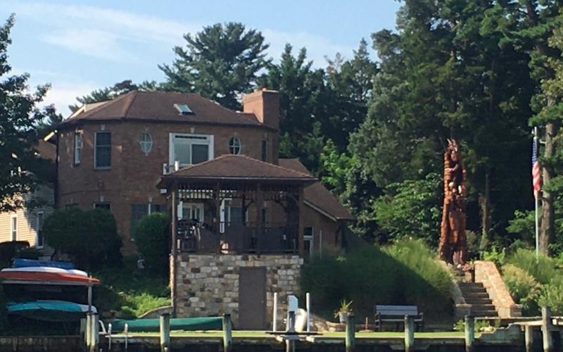 Note the carving near the stairs to this home on Stony Point.