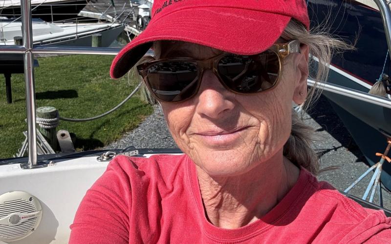 Antoinette Wilkins, skipper of In the Red, in her red cap.