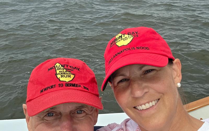 Holly Tompkins and Brad Cole watching the Annapolis 3-2-1 Invitational