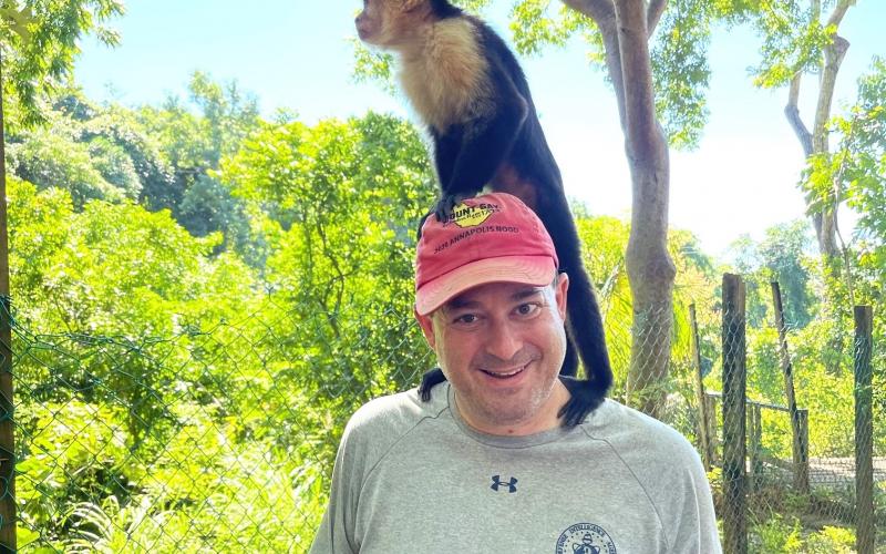 Jim Kaplan and a monkey he met in Honduras.